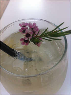 Fancy cocktail with purple flowers