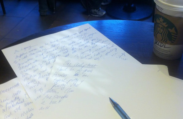 Handwritten notes on white paper.