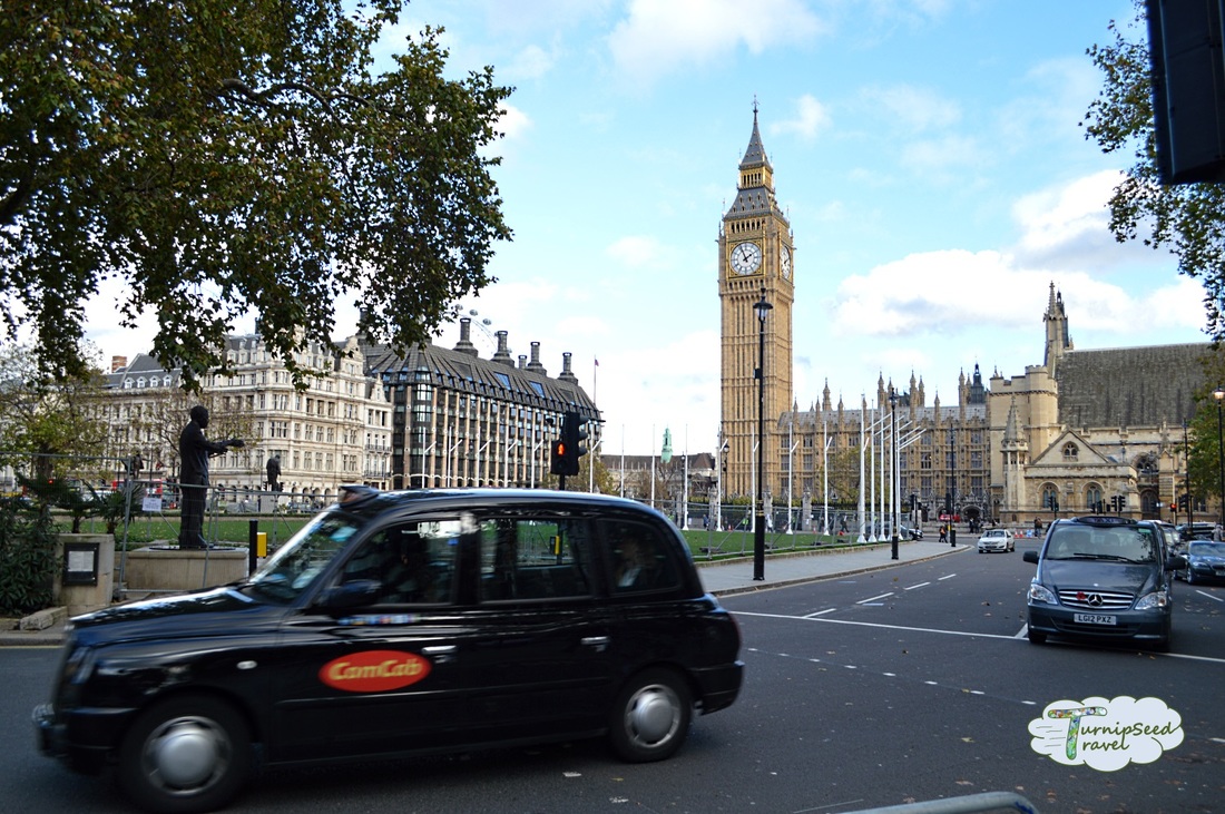 Big Ben and the British parliament with London taxi cabs Picture