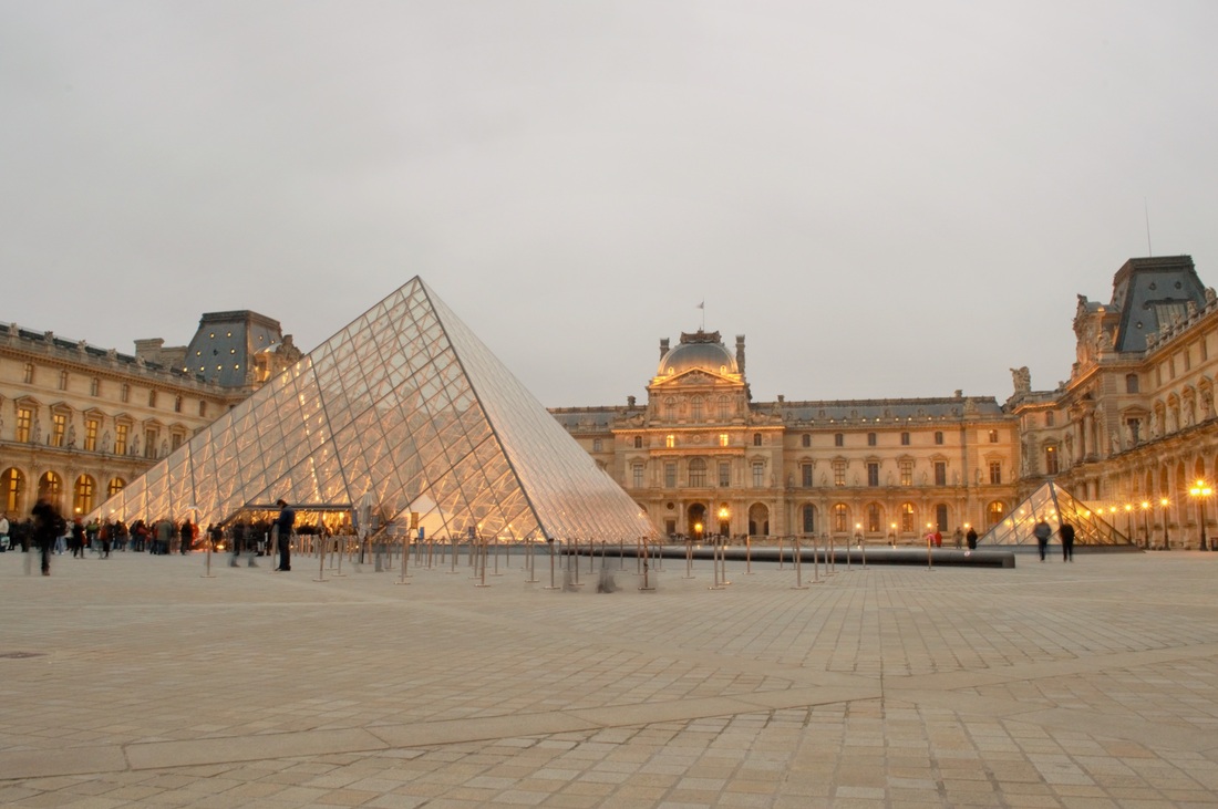 The Louvre's main entrance is the pyramid in the courtyard.  Paris TurnipseedTravel.com