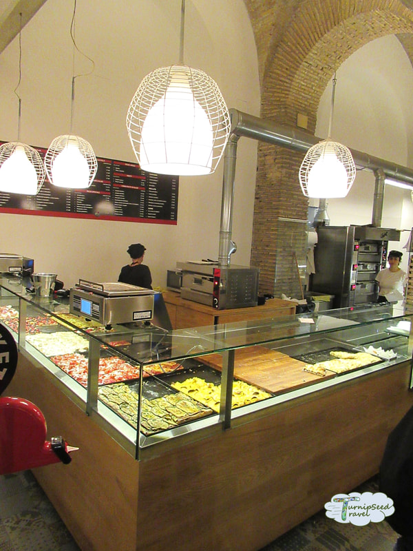Inside Rome's yummiest food tour! Inside Alice Pizza. 