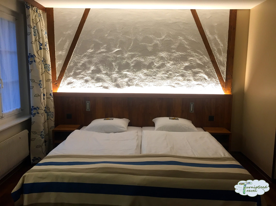 Where to stay in Zurich: White hotel bed Picture