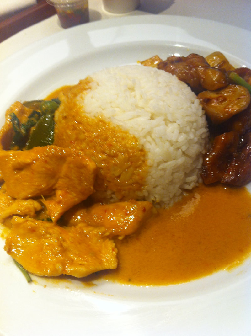 Rice, red curry chicken, and cashew chicken in Thailand 