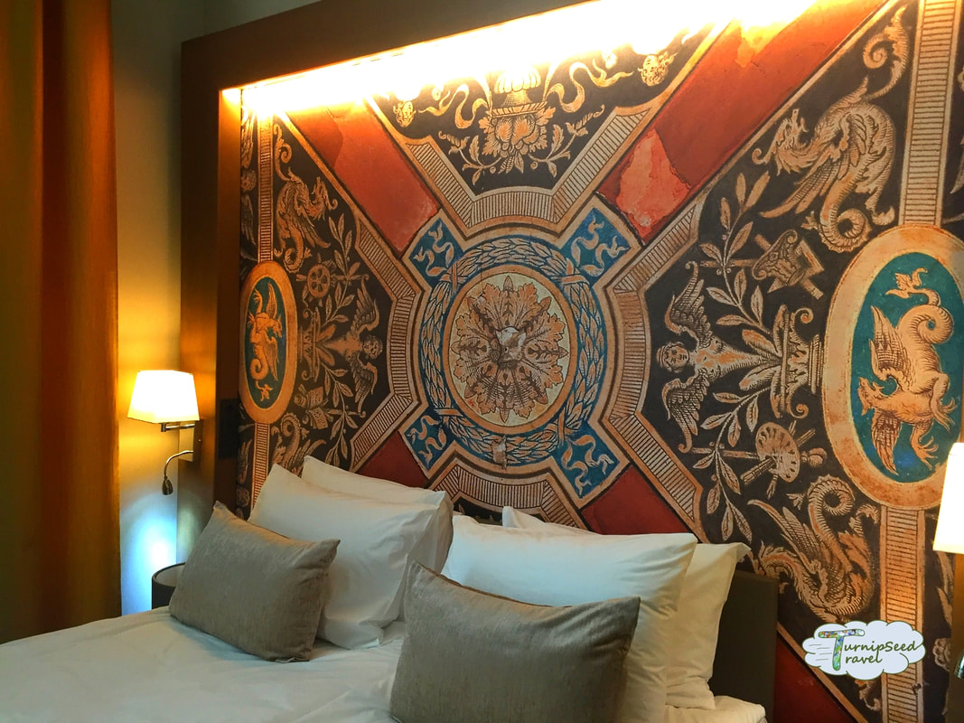 Where to stay in Budapest Hotel Moments Budapest review - headboard and light. Picture