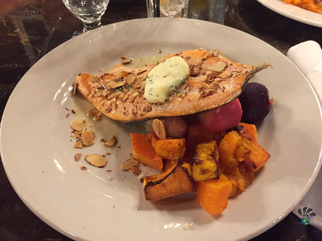 Plate of trout with almonds, potatoes, and roasted squash. Glacier Distilling and the Glacier Park Lodge's Great Northern Dining Room