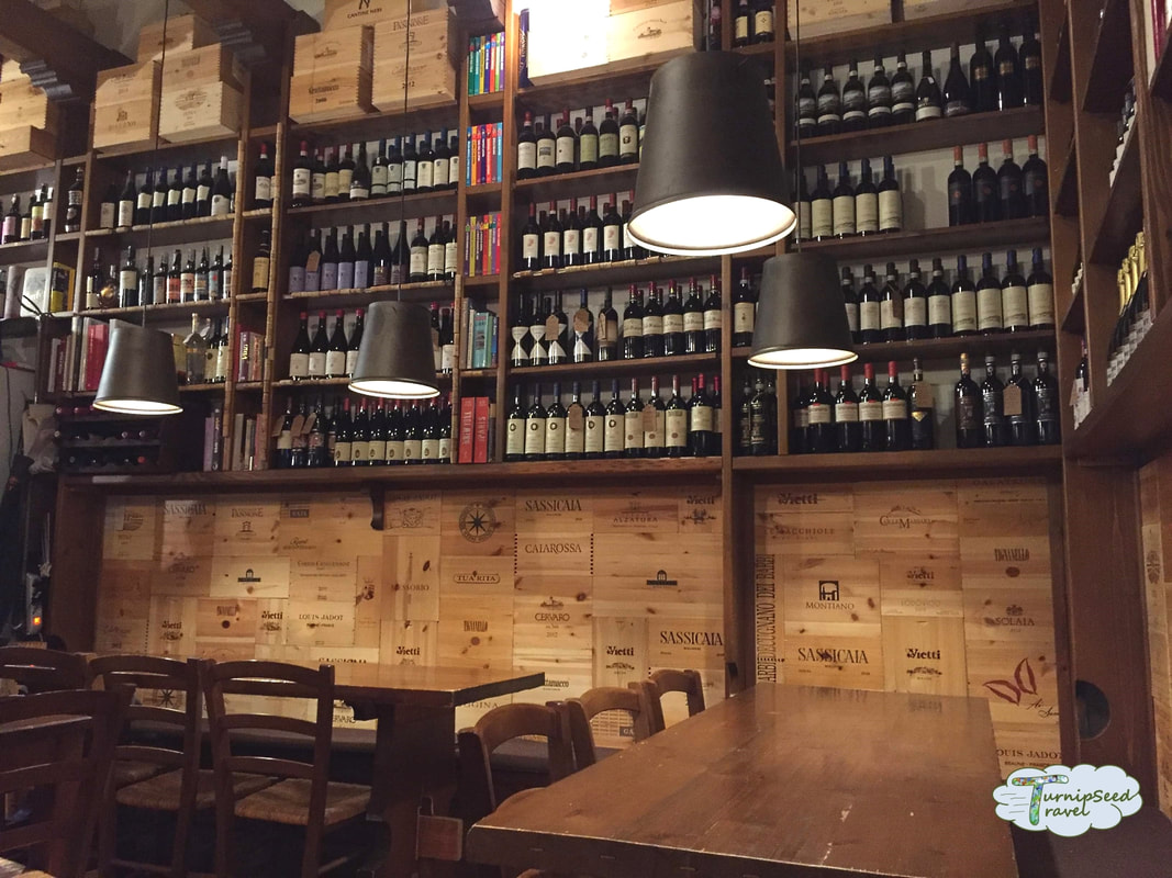 Inside a wine bar in Orvieto Italy from TurnipseedTravel.com