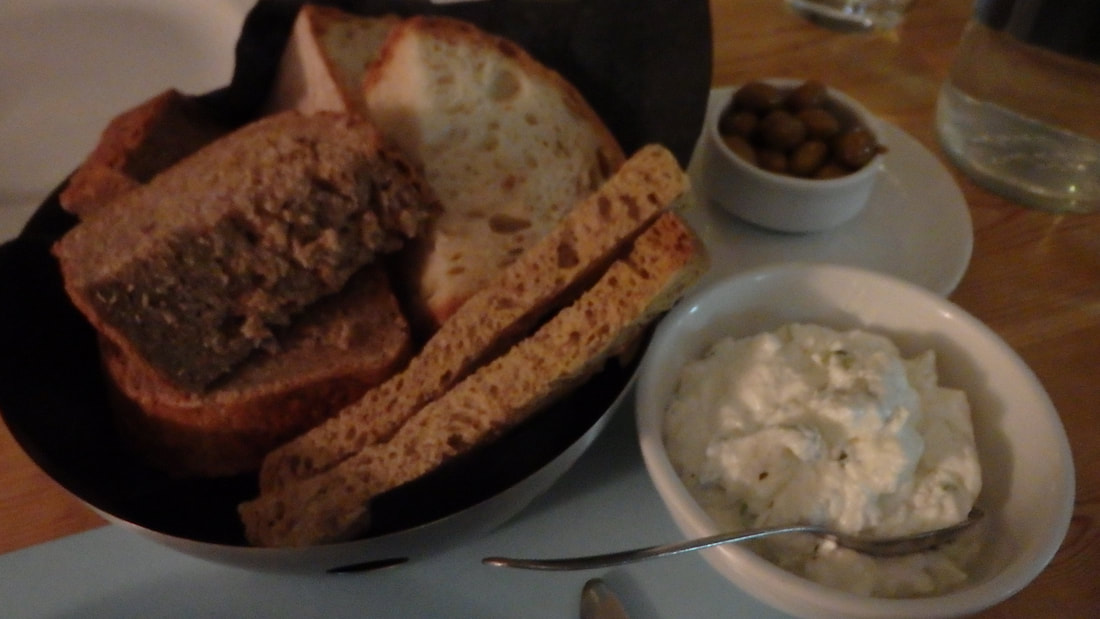 Free bread and yogurt dip at a restaurant in Athens.