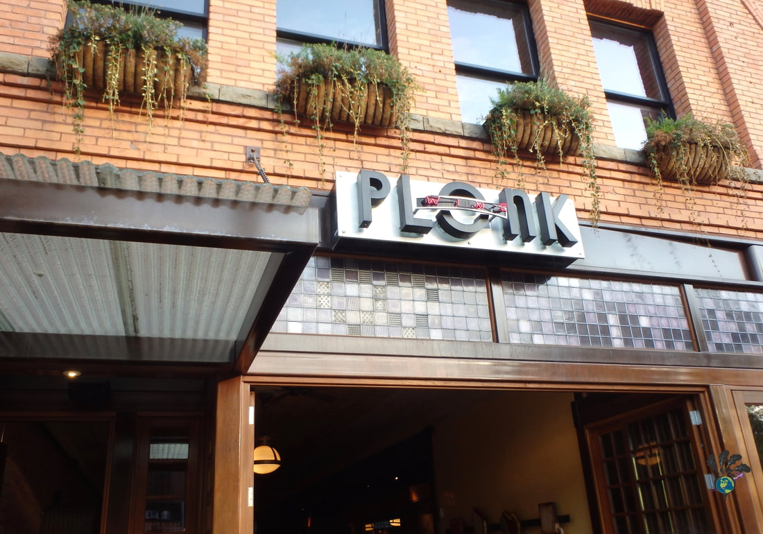 Exterior of brick building with Plonk Wine sign in Missoula MontanaPicture