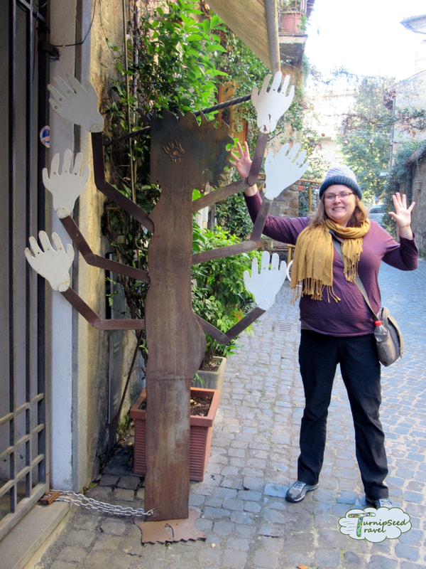 Vanessa posing outside a shop in Orvieto 
