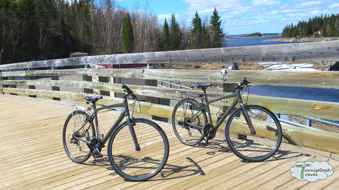 Cycling Quebec véloroute des bleuets Two bikes on a wooden bridge Picture