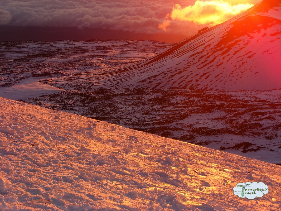 Snow covered volcano at dusk Picture