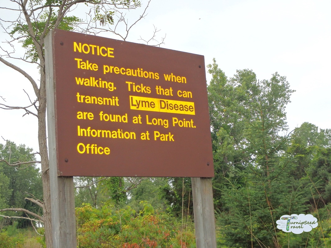 Sign at Long Point Provincial Park campground advising about ticks Picture