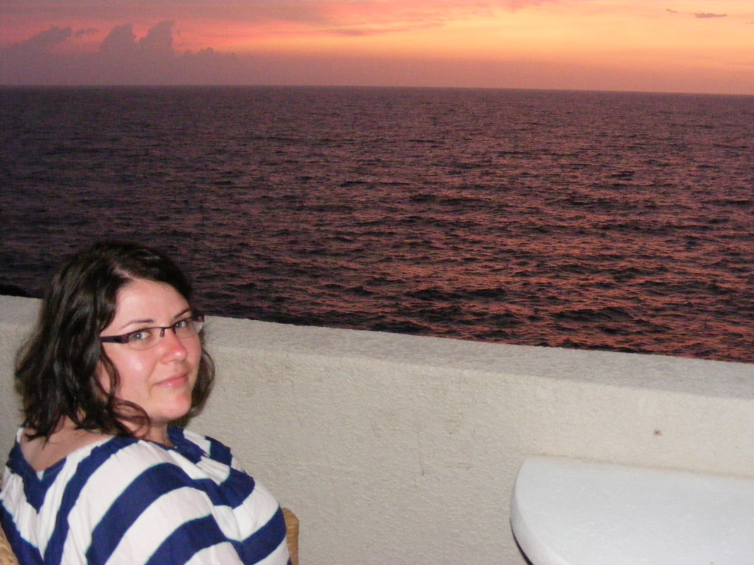 How to cancel a non-refundable hotel reservation during COVID 19: Vanessa looking out of a hotel balcony in Hawaii Picture