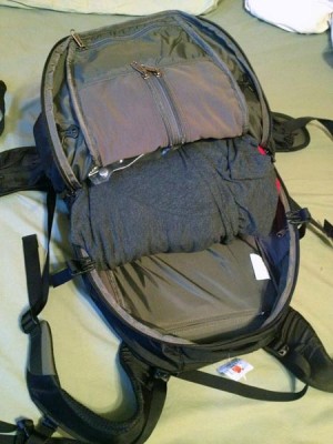Open backpack mid-packing Picture