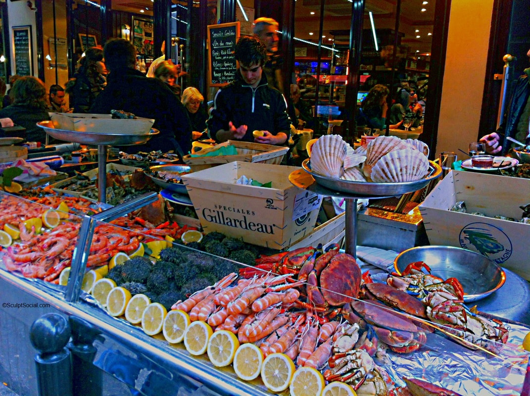 Fish market in Paris with colorful seafood set out in bowls and traysPicture