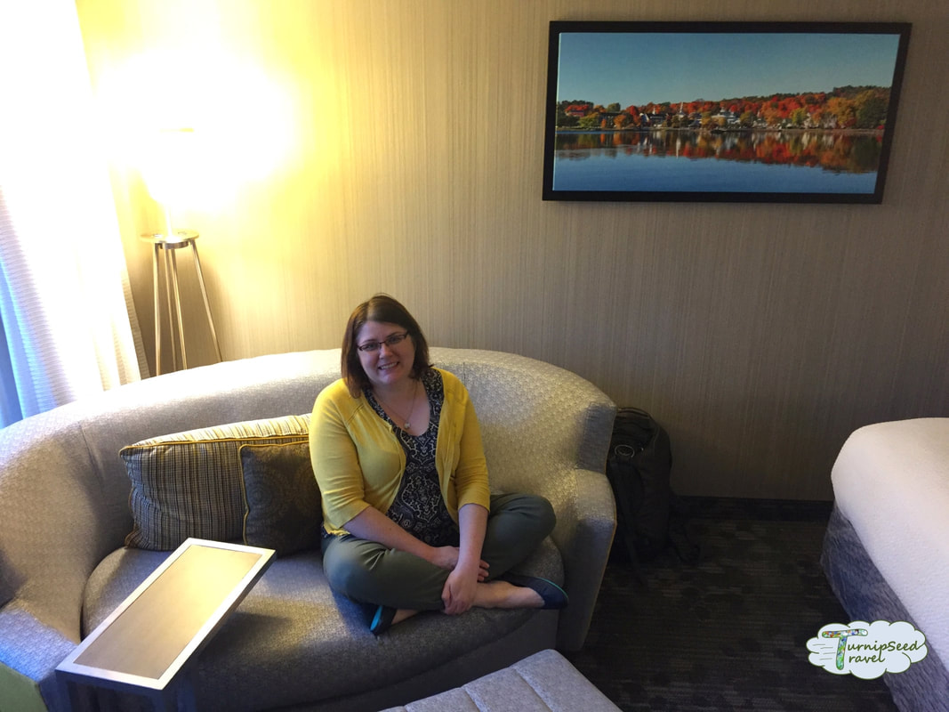 Vanessa on a couch in a hotel in Concord New Hampshire Picture
