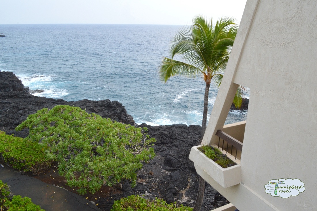 View of the ocean crashing into lava rock from the hotel balcony Picture