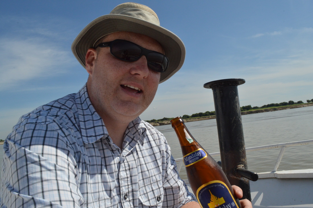 Ryan drinks beer on board the boat - Mandalay Bagan MGRG Express Boat Irrawaddy River TurnipseedTravel.com