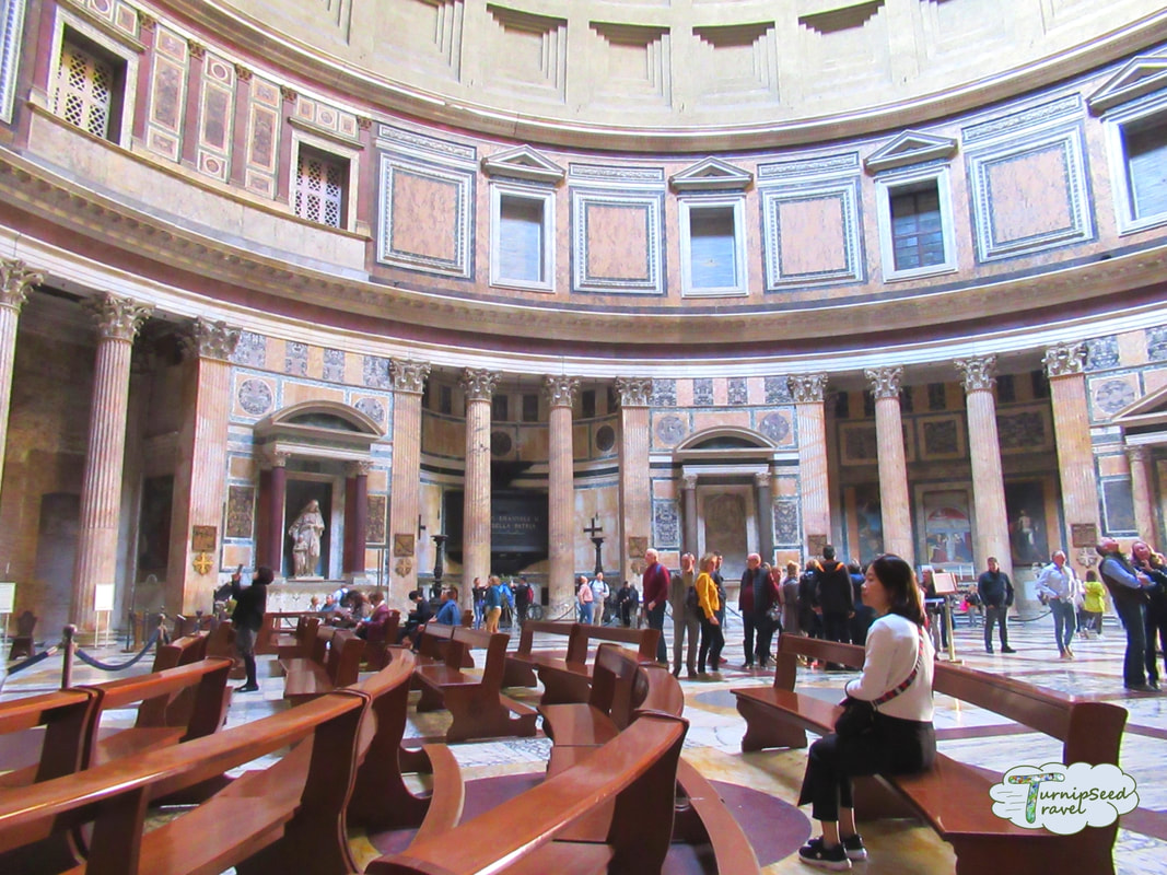The Pantheon interior with tourists taking photos .Picture