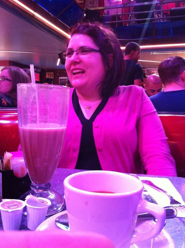 Vanessa sits in a crowded diner Picture