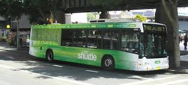 Green shuttle bus