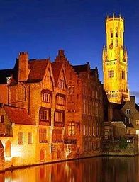 Bruges at night showing a bridge and church Picture
