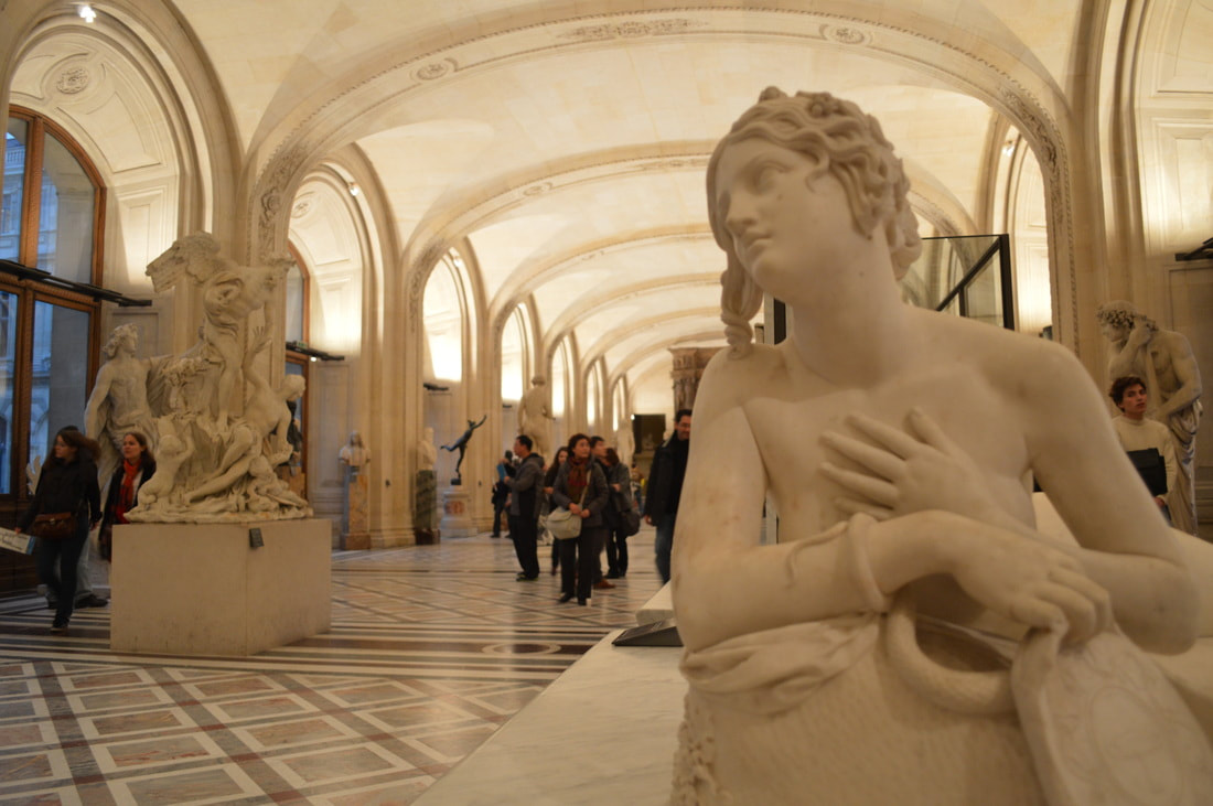 White statues in the Louvre Picture