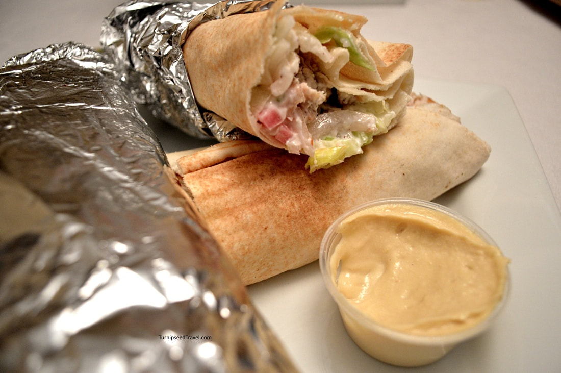 Shawarma sandwich wrapped in tin foil Cozy microadventures for Ottawa travellers by TurnipseedTravel.com