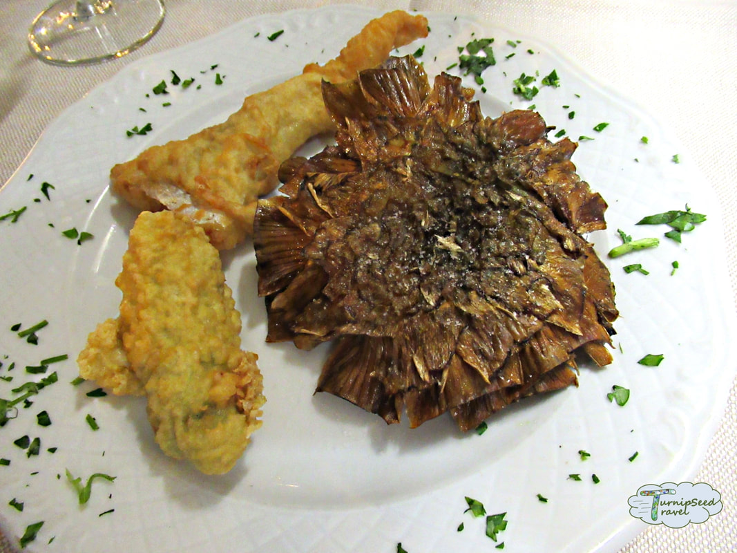 Jewish-Roman food including a deep fried artichoke in Rome. Picture