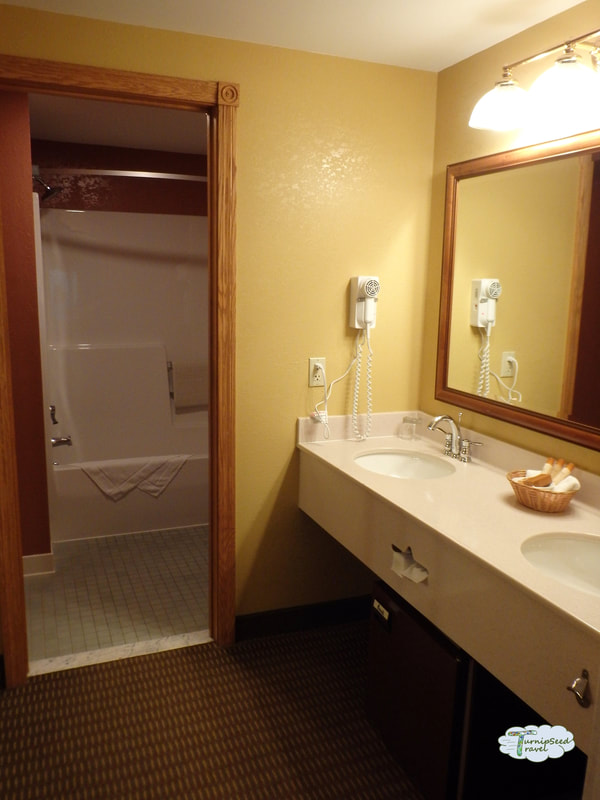 Bathroom sink and closet at Holiday Valley resort 
