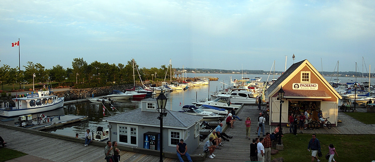 Things to do in Charlottetown Harbour front marina shops and buildings and dusk
