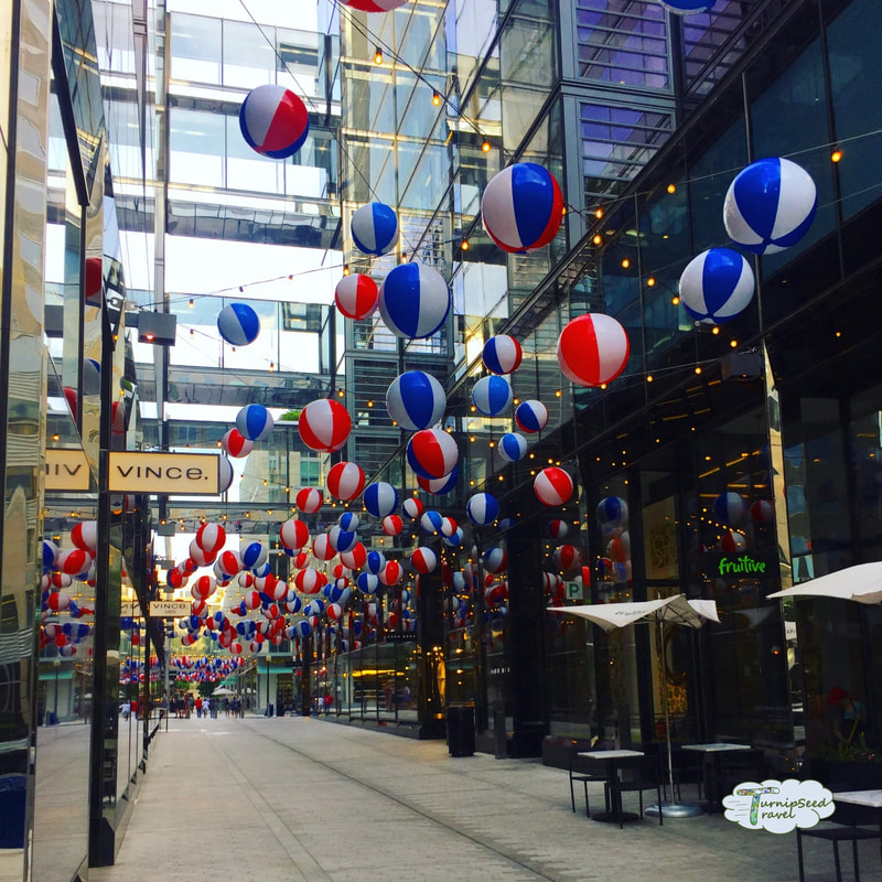CityCenterDC festive street with beach balls hanging from the sky Picture