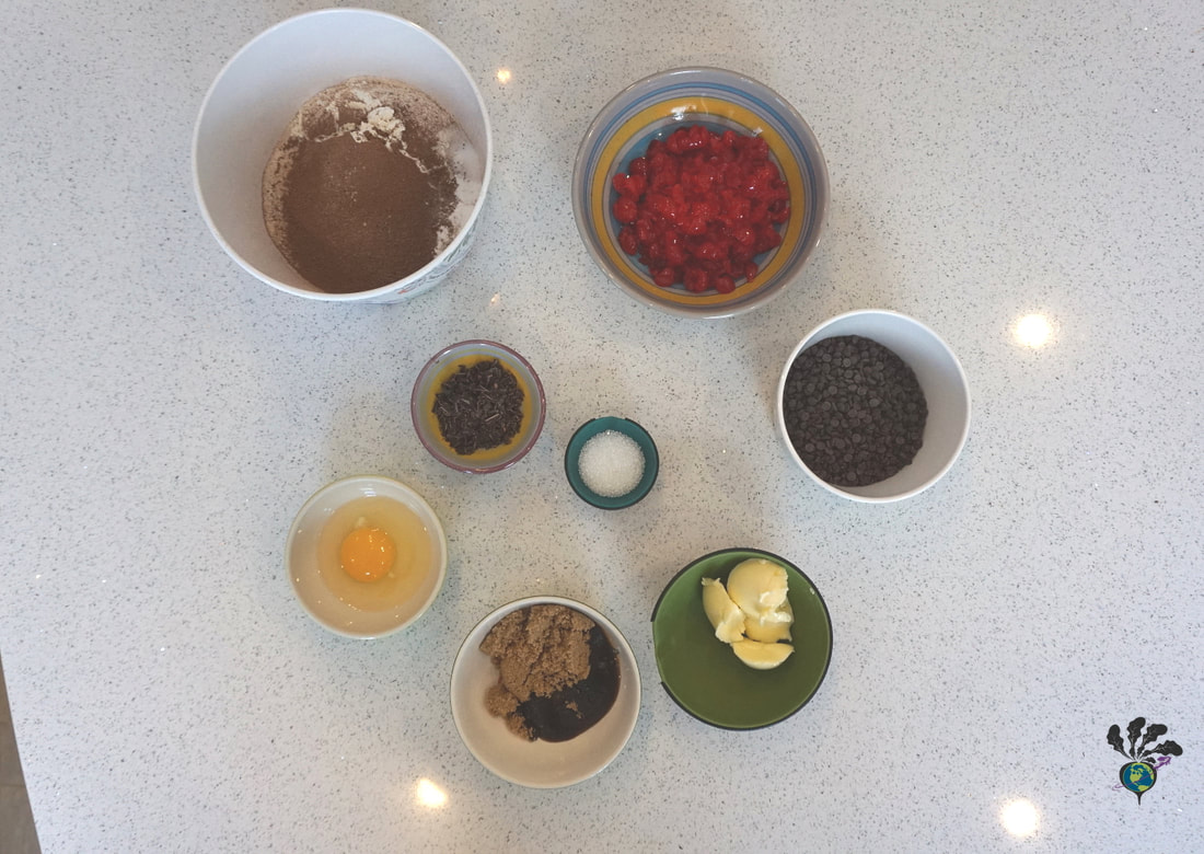 Bowls of baking ingredients, shot from above, arranged on a white speckled countertop Picture