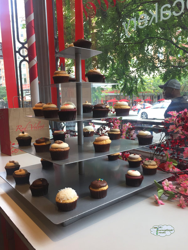 Cupcake display in a window at Red Velvet Cupcakery in Washington DC Picture