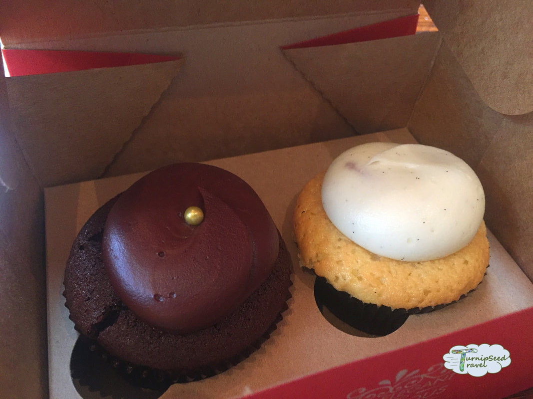 Chocolate cupcake and vanilla cupcake in a box from Red Velvet Cupcakery in Washington DC Picture