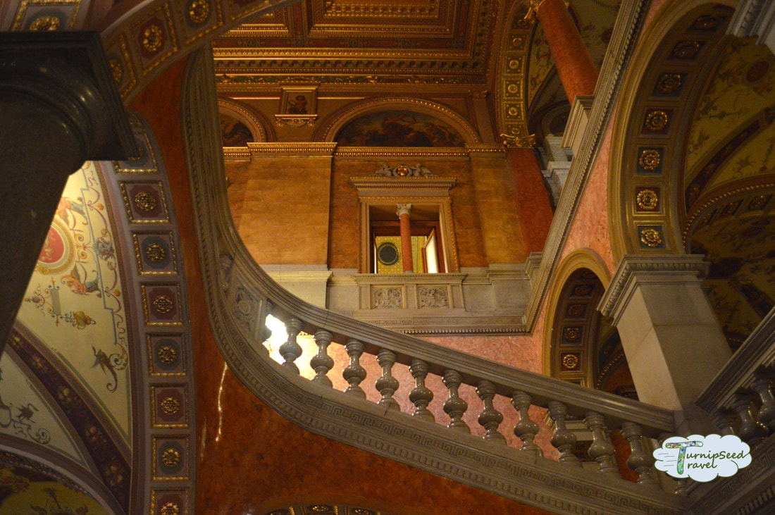 A view of the staircase and ceiling seen while touring the Hungarian state opera house.