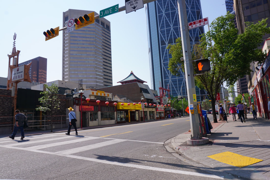 A street in Calgary's Chinatown with skyscrapers in the background Picture
