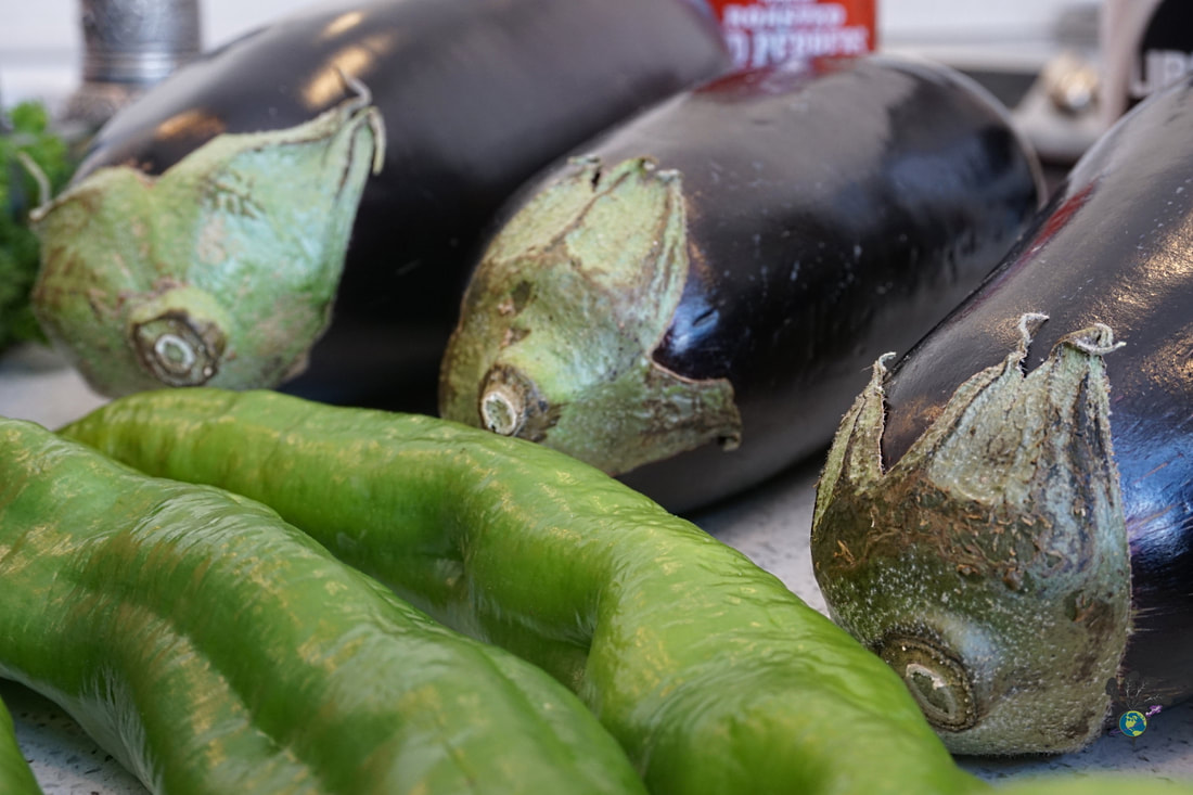 Preparing Turkish cuisine: Close up of Eggplants and Hungarian peppersPicture