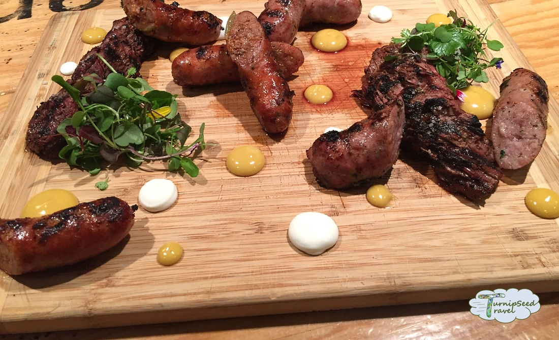 Lunch spots in Montreal: Platter of sausages and garnishesPicture