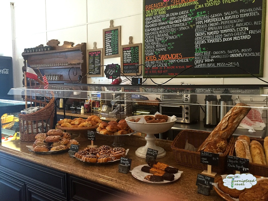 Bakery display and menu at the cafe Picture