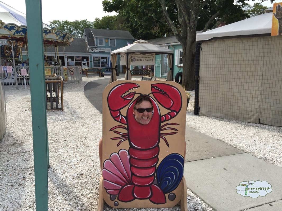 Ryan poses with a lobster sign Picture