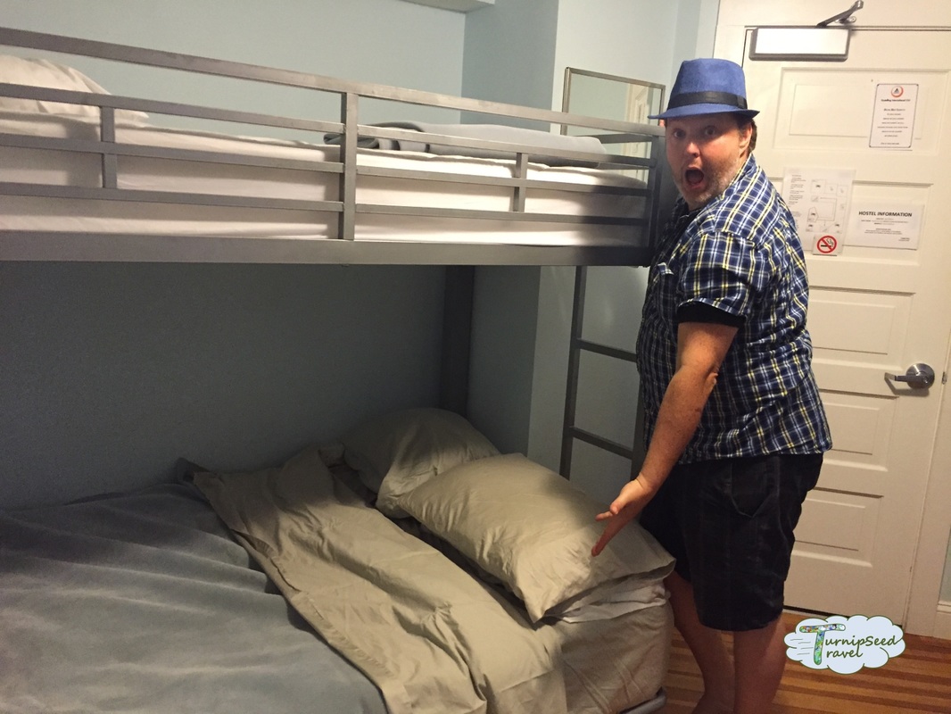 Ryan shows off the bunk beds Picture