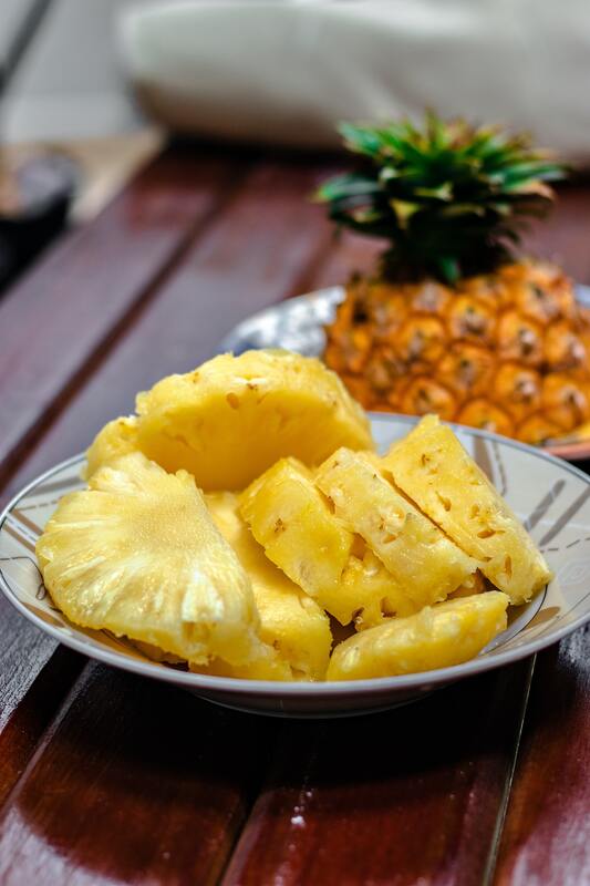 A plate of cut pineapple