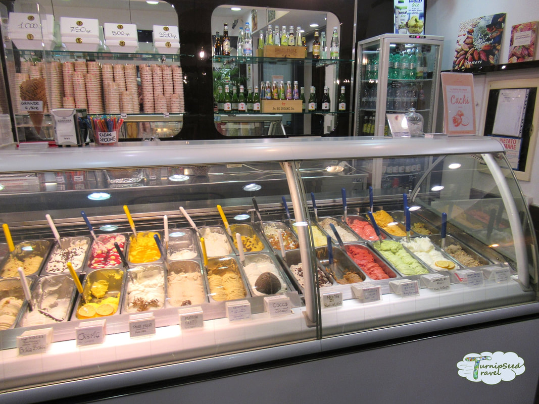Sampling gelato flavors in Rome 