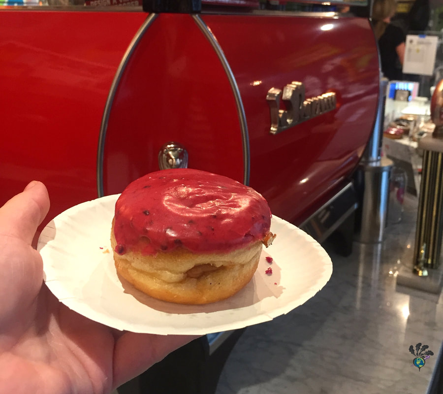 Greenwich Village Food Tour New York: Red espresso machine and a pink glazed donut
