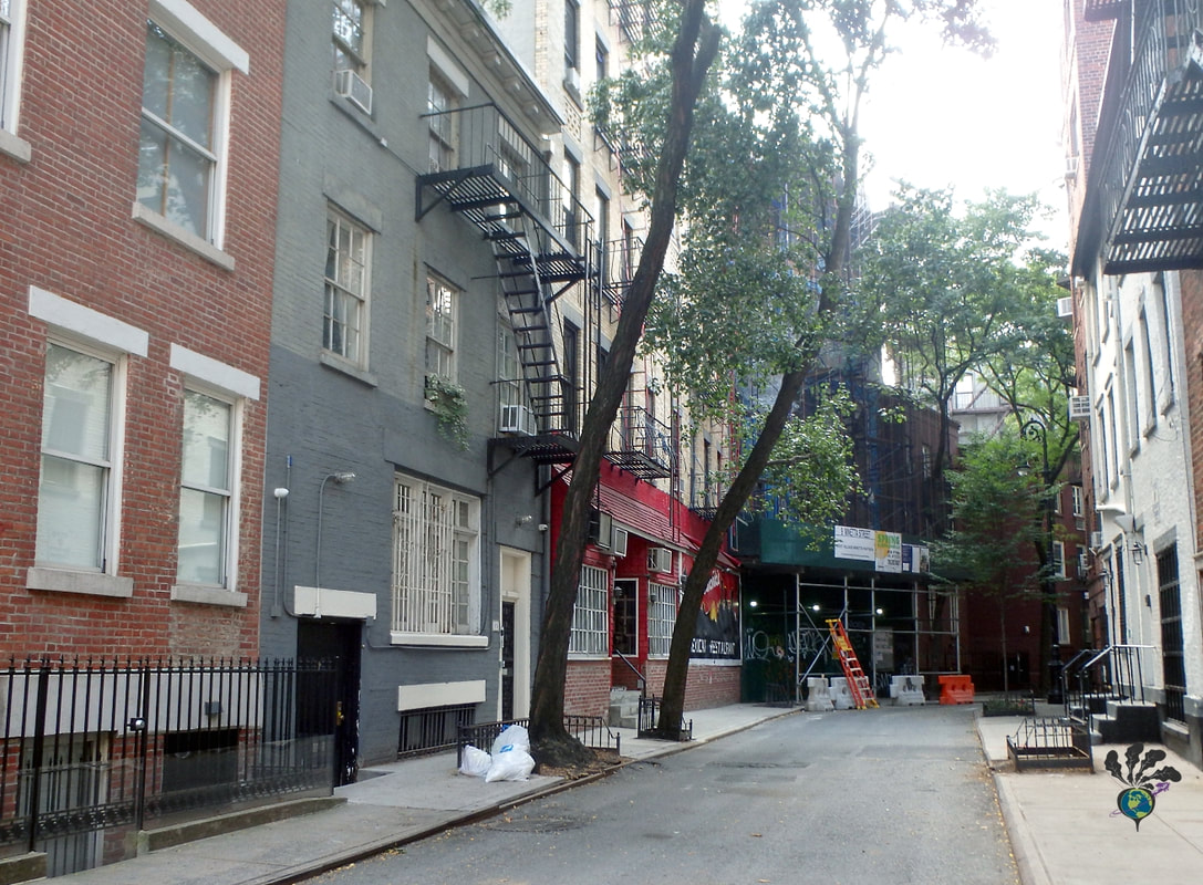 Greenwich Village food tour New York: Quiet city street with trees and fire escapes