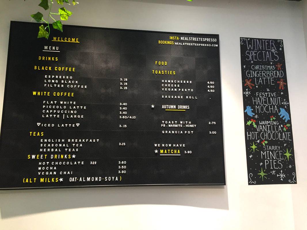The black coffee shop menu, showing different drinks and light food itemsPicture