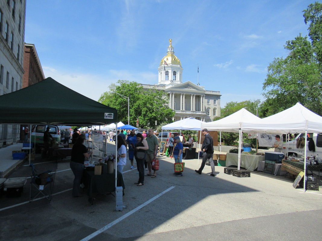 View of the Concord, NH, farmers' market outside the state housePicture