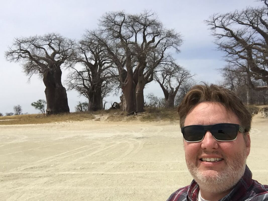 Ryan grabs a selfie in front the Baobab trees.
