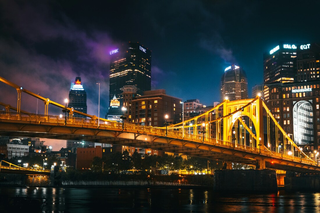 Bridges and skyline of Pittsburgh lit up at night Picture